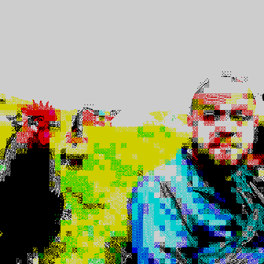 Alexandru Badiu with a rooster in a Faroese village, rendered in ZX Spectrum colours